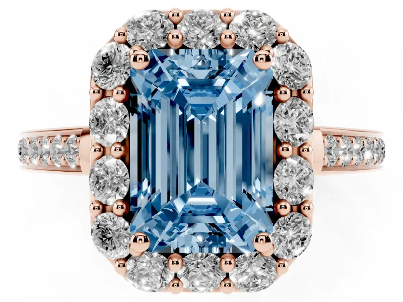 Fancy Blue Emerald Cut Diamond Floral Halo Ring Set in Rose gold with Pavé Band and Prong Setting