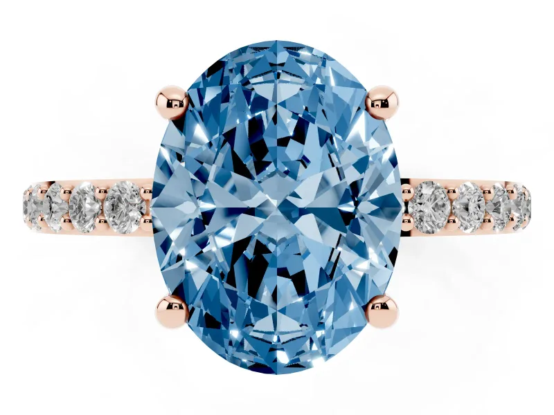Fancy Blue Oval Cut Diamond Solitaire Ring Set in Rose gold with Round Pavé Band and Prong Setting
