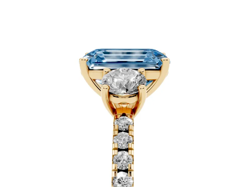Emerald Cut Three Stone Engagement Ring Setting for a Fancy Blue Lab-Grown Diamond | Pave Shoulders | Yellow Gold
