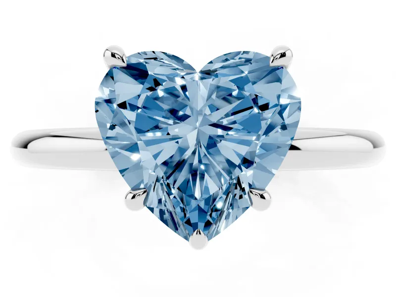 Fancy Blue Heart Cut Diamond Solitaire Ring Set in White gold with Thin Band and Prong Setting