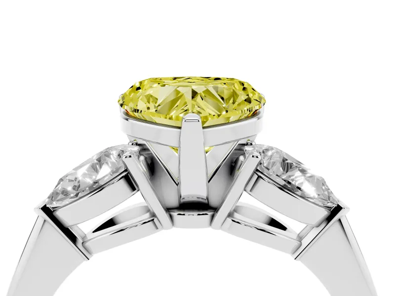 Fancy Yellow Three-Stone Heart Cut Diamond Ring Set in White gold with Pear Side Stones and Prong Setting