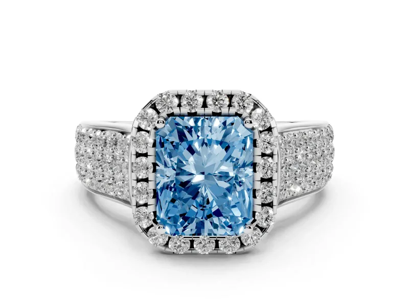 Fancy Blue Radiant Cut Diamond Halo Ring Set in Platinum with Pavé Band and Raised Center Setting