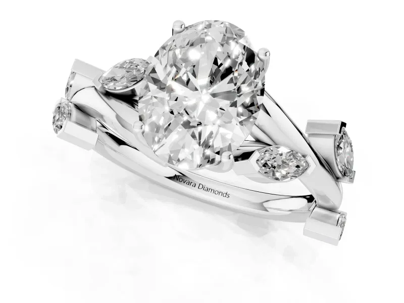 Oval Cut Diamond Solitaire Ring Set in White gold with Twisted Marquise Accent Band