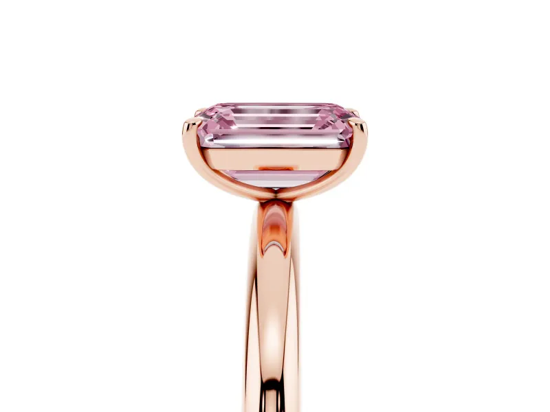 Fancy Pink Emerald Cut Diamond Solitaire Ring Set in Rose gold with Prong Setting on a Polished Plain Band