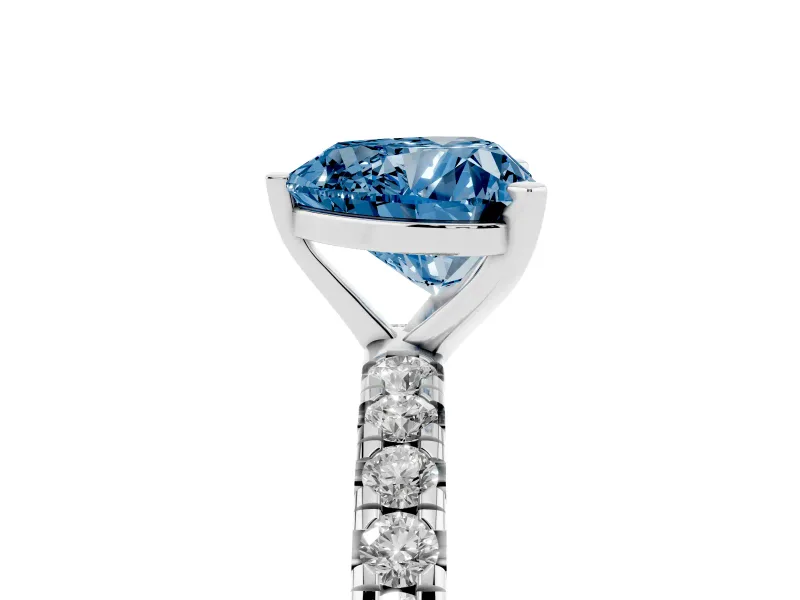 Fancy Blue Heart Cut Diamond Pavé Solitaire Ring Set in White gold with Round Band and Prong Setting