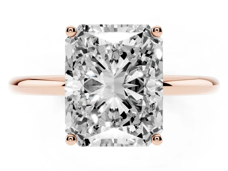 Radiant Cut Diamond Solitaire Engagement Ring Set in Rose gold with Thin Band and Prong Setting