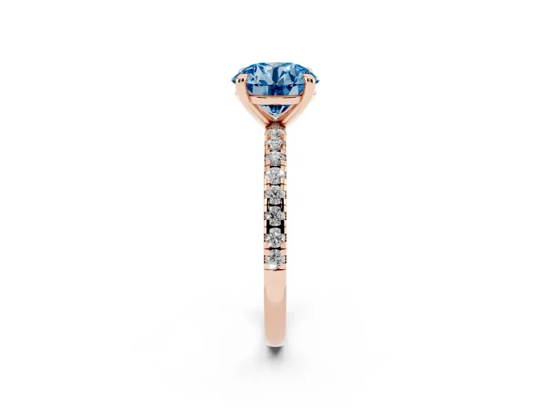 Fancy Blue Round Cut Diamond Brilliant Solitaire Ring Set in Rose gold with Pavé Band and Prong Setting