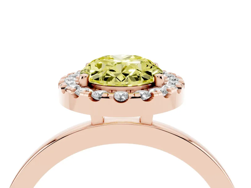 Fancy Yellow Oval Cut Diamond Halo Solitaire Ring Set in Rose gold with Pavé Band and Prong Setting