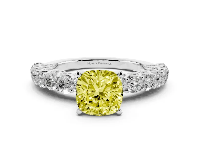 Fancy Yellow Cushion Cut Diamond Solitaire Ring Set in White gold with Shared Prong Pavé Band