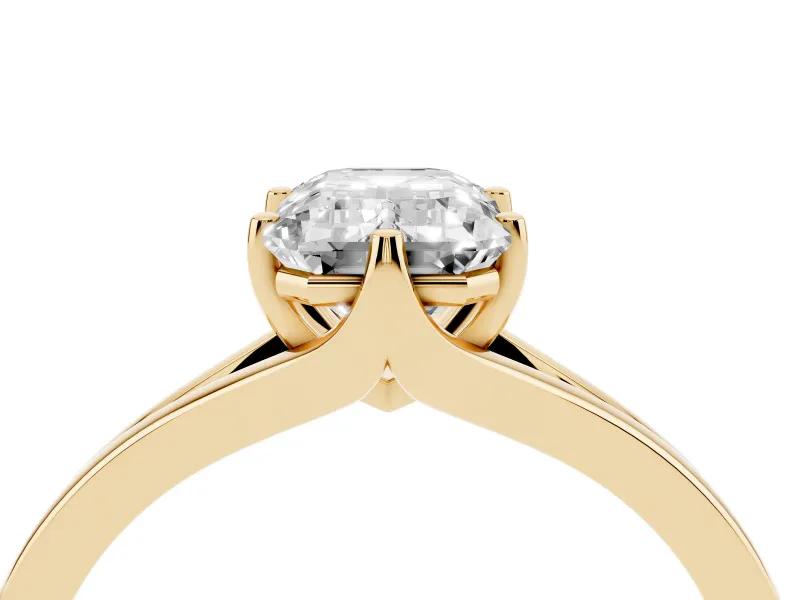 Emerald Cut Diamond Solitaire Ring Set in Yellow gold with Polished Tapered Band and Prong Setting