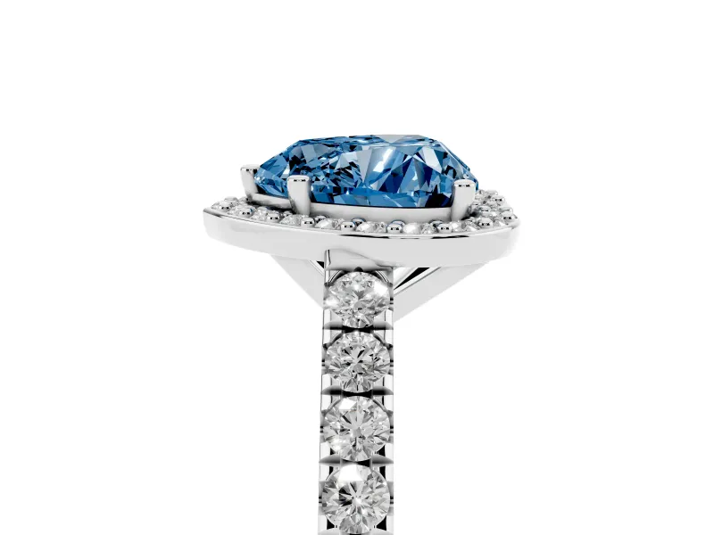 Fancy Blue Heart Cut Diamond Halo Engagement Ring Set in White gold with Pavé Band and Prong Setting