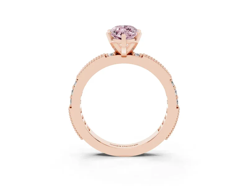 Fancy Pink Marquise Cut Diamond Solitaire Ring Set in Rose gold with Slim Pavé Band and Prong Setting