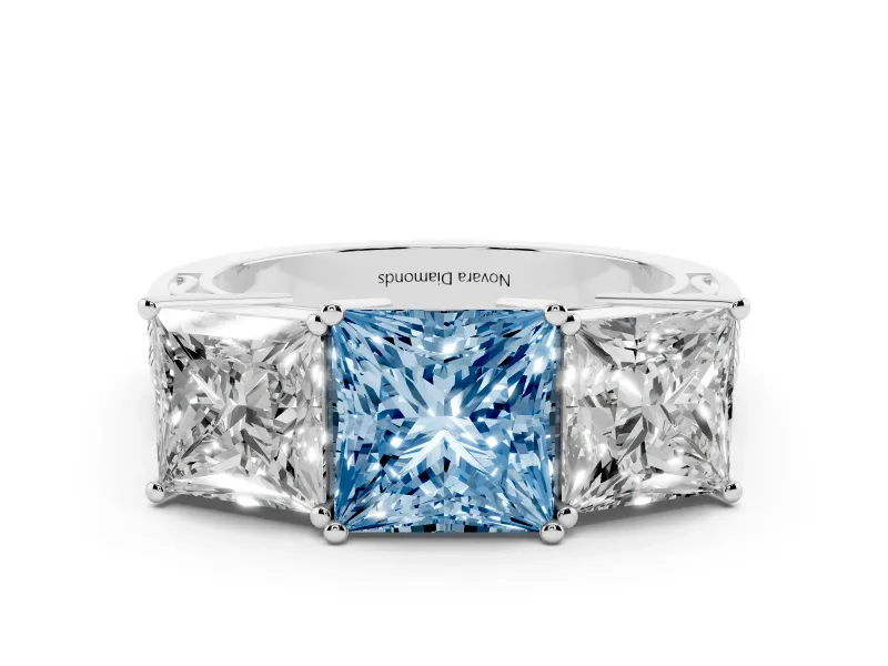 Fancy Blue Princess Cut Diamond Three-Stone Ring Set in White gold with Textured Band