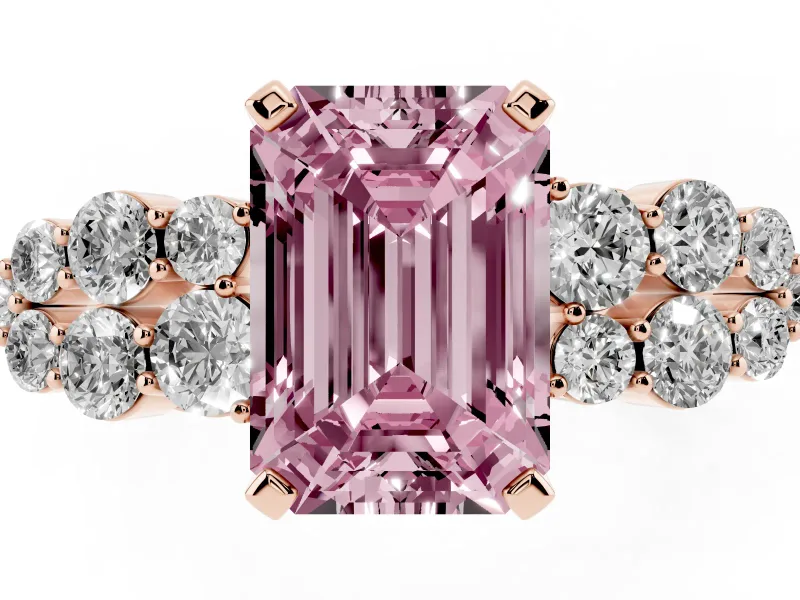 Fancy Pink Emerald Cut Diamond Cluster Engagement Ring Set in Rose gold with Pavé Band and Prong Setting