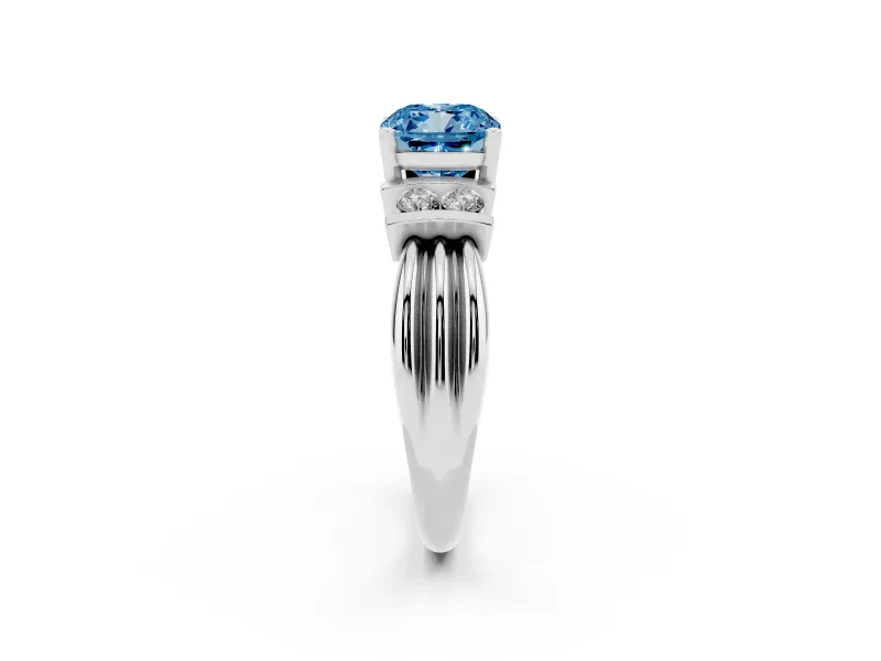 Fancy Blue Three-Stone Cushion Cut Diamond Channel Set Ring Set in Platinum with Bar Prongs