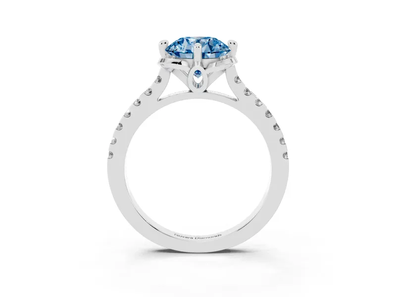 Fancy Blue Round Cut Diamond Solitaire Ring Set in Platinum with Pavé Band and Floral Prong Setting