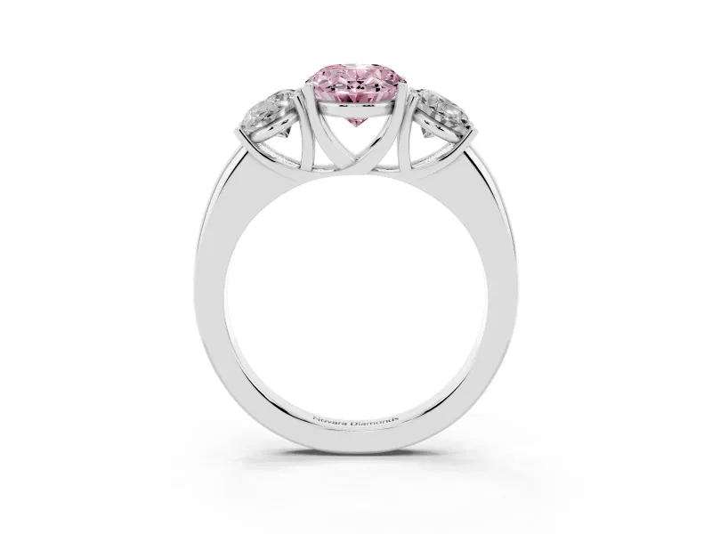 Fancy Pink Oval Cut Diamond Three-Stone Ring Set in White gold with Bold Center and Classic Band
