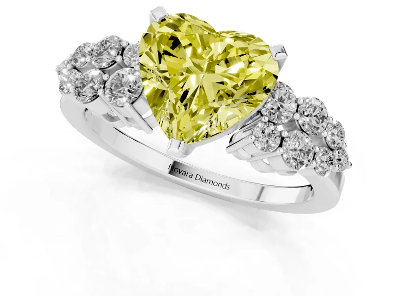 Fancy Yellow Heart Cut Diamond Cluster Engagement Ring Set in Platinum with Pavé Band and Prong Setting