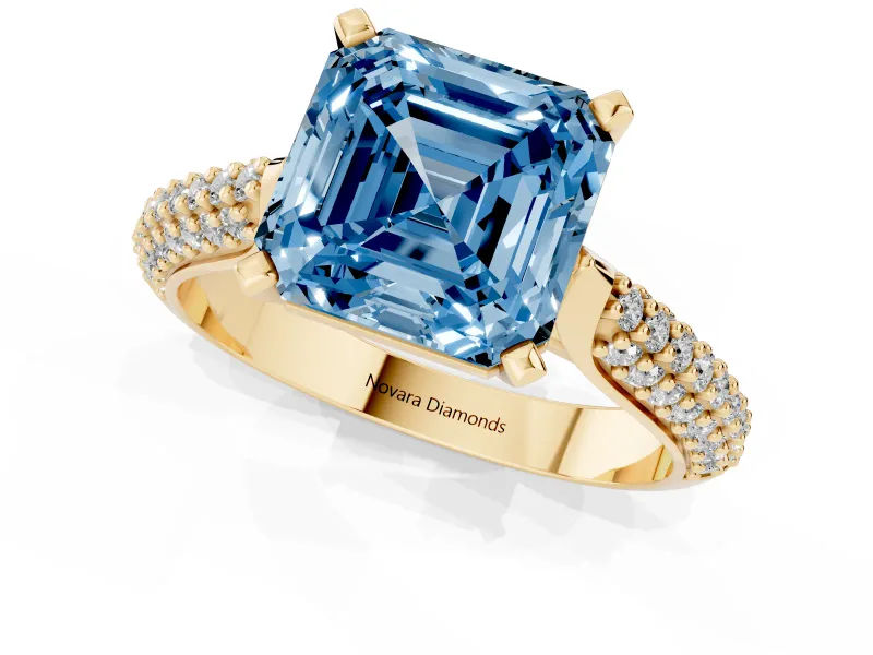 Fancy Blue Asscher Cut Diamond Solitaire Engagement Ring Set in Yellow gold with Multi-Row Round Pavé Band and Prong Setting
