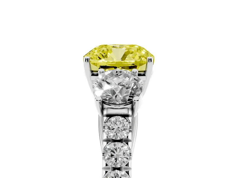 Fancy Yellow Cushion Cut Diamond Three-Stone Ring Set in Silver with Round Side Stones and Delicate Pavé Band