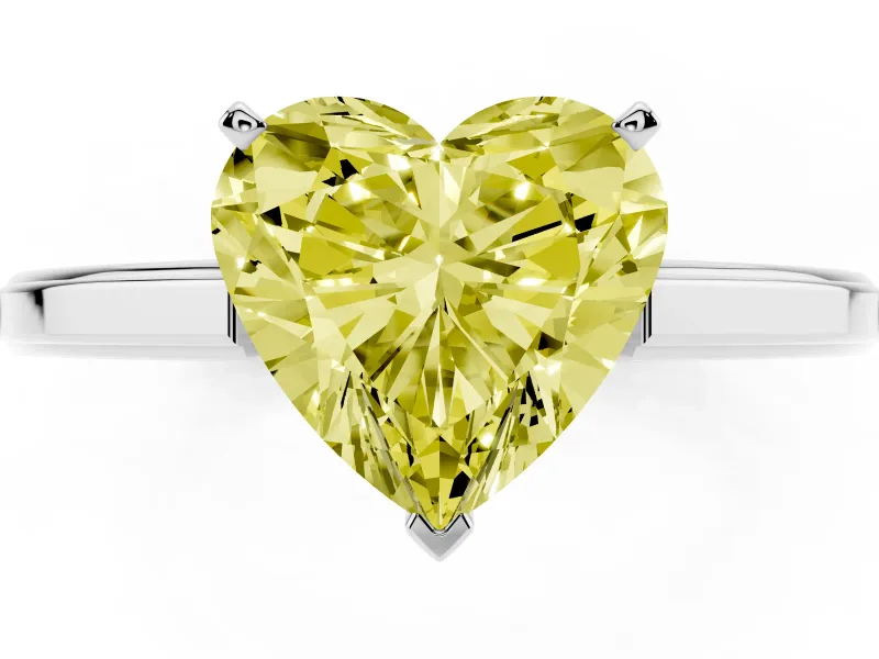 Fancy Yellow Heart Cut Diamond Solitaire Ring Set in White gold with Prong Setting and Classic Band