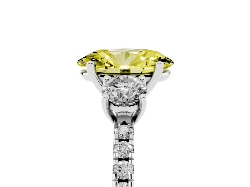 Fancy Yellow Oval Cut Diamond Three-Stone Ring Set in Silver with Pavé Band and Graduated Sides
