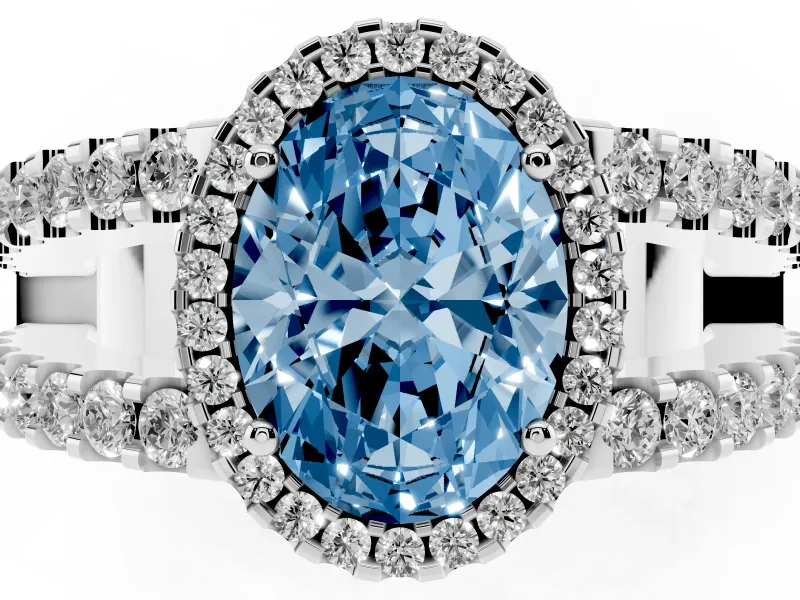 Fancy Blue Oval Cut Diamond Halo Ring Set in White gold with Pavé Split Shank and Prong Setting
