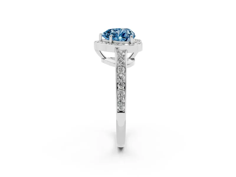 Fancy Blue Heart Cut Diamond Halo Pavé Engagement Ring Set in Platinum with Bezel Setting