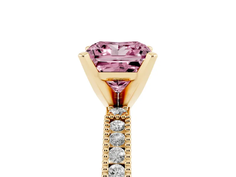 Fancy Pink Princess Cut Diamond Solitaire Ring Set in Yellow gold with Slim Pavé Band and Prong Setting