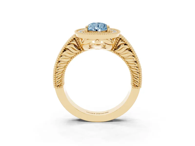Fancy Blue Pear Cut Diamond Halo Ring Set in Yellow gold with Round Accent Halo, Pavé Band and Prong Setting