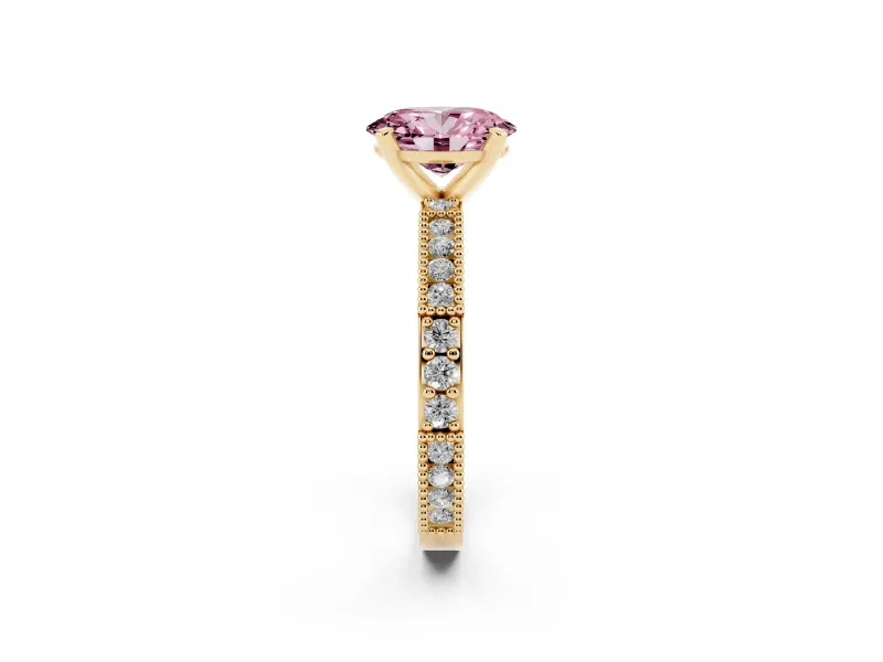 Fancy Pink Oval Cut Diamond Solitaire Ring Set in Yellow gold with Slim Pavé Band and Prong Setting