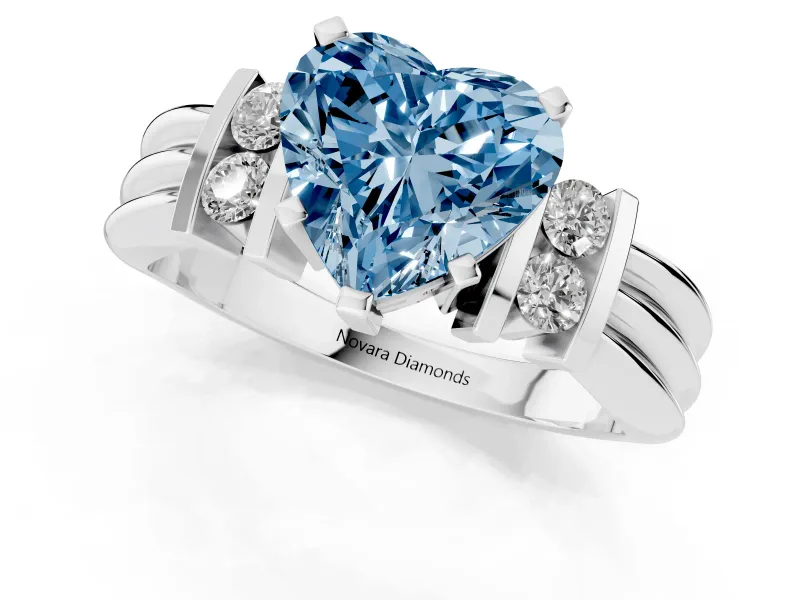 Fancy Blue Three-Stone Heart Cut Diamond Channel Set Ring Set in Silver with Bar Prongs