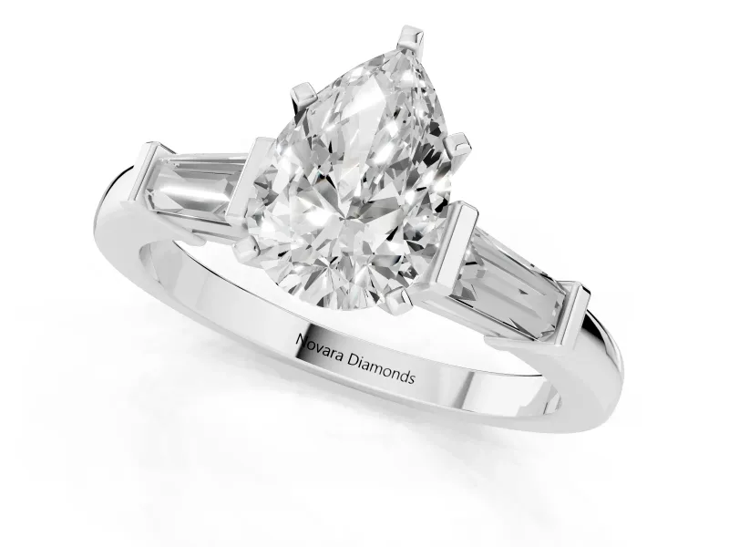 Pear Cut Diamond Solitaire Ring Set in White gold with Tapered Baguette Accents and Prong Setting