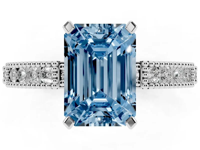 Fancy Blue Emerald Cut Diamond Solitaire Ring Set in Platinum with Slim Pavé Band and Prong Setting