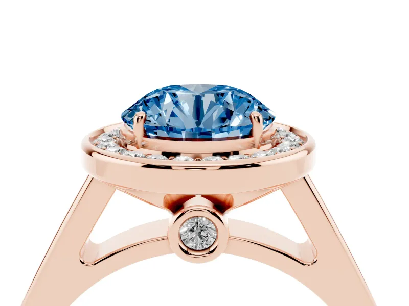 Fancy Blue Round Cut Diamond Halo Solitaire Ring Set in Rose gold with Pavé Band and Bezel Setting