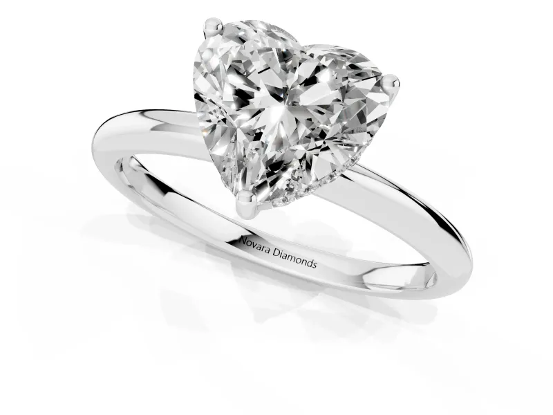 Heart Cut Diamond Solitaire Engagement Ring Set in White gold with Prong Setting and Polished Band