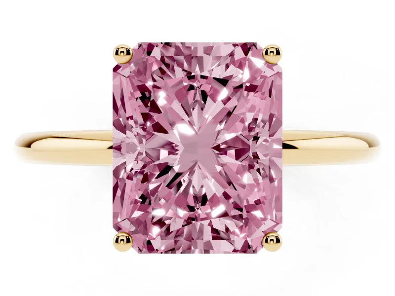 Fancy Pink Radiant Cut Diamond Solitaire Engagement Ring Set in Yellow gold with Thin Band and Prong Setting