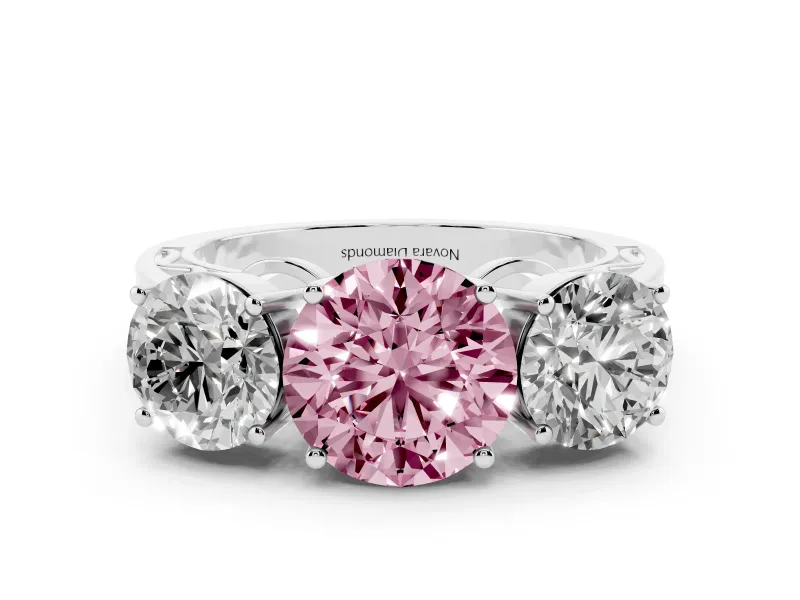 Fancy Pink Round Cut Diamond Three-Stone Ring Set in White gold with Textured Band