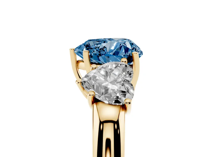 Fancy Blue Heart Cut Diamond Three-Stone Ring Set in Yellow gold with Bold Center and Classic Band