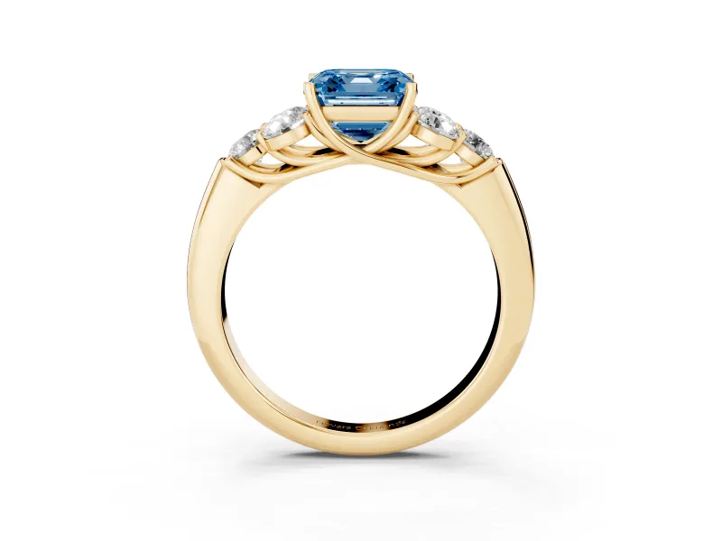 Fancy Blue Asscher Cut Diamond Cluster Ring Set in Yellow gold with Round Accent Stones and Prong Setting on a Plain Band