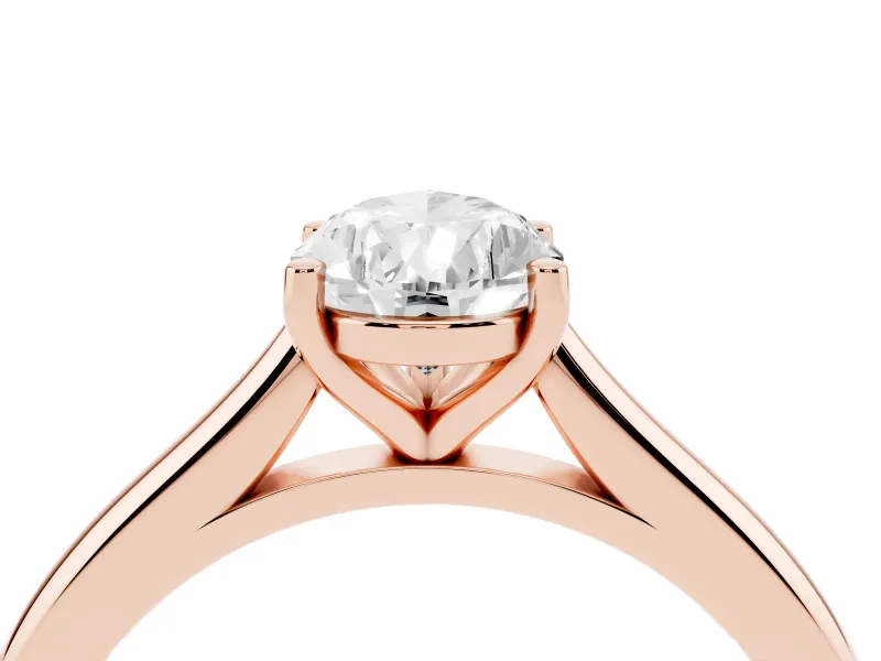 Pear Cut Diamond Solitaire Ring Set in Rose gold with Cathedral Band and Prong Setting