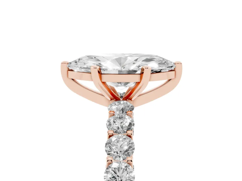 Marquise Cut Diamond Solitaire Ring Set in Rose gold with Shared Prong Pavé Band