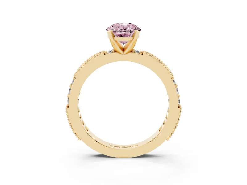 Fancy Pink Oval Cut Diamond Solitaire Ring Set in Yellow gold with Slim Pavé Band and Prong Setting