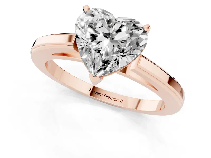Heart Cut Diamond Solitaire Ring Set in Rose gold with Prong Setting and Classic Band