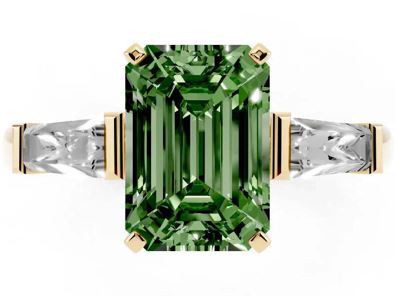 Fancy Green Emerald Cut Diamond Solitaire Ring Set in Yellow gold with Tapered Baguette Side Stones and Prong Setting
