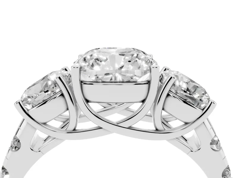 Cushion Cut Diamond Three-Stone Ring Set in Platinum with Pavé Band