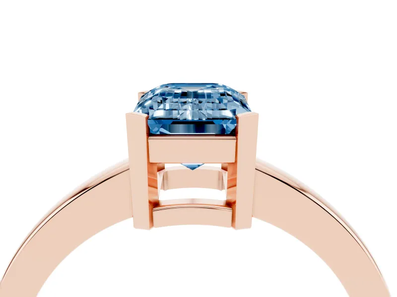 Fancy Blue Emerald Cut Diamond Solitaire Ring Set in Rose gold with Prong Head and Smooth Polished Band