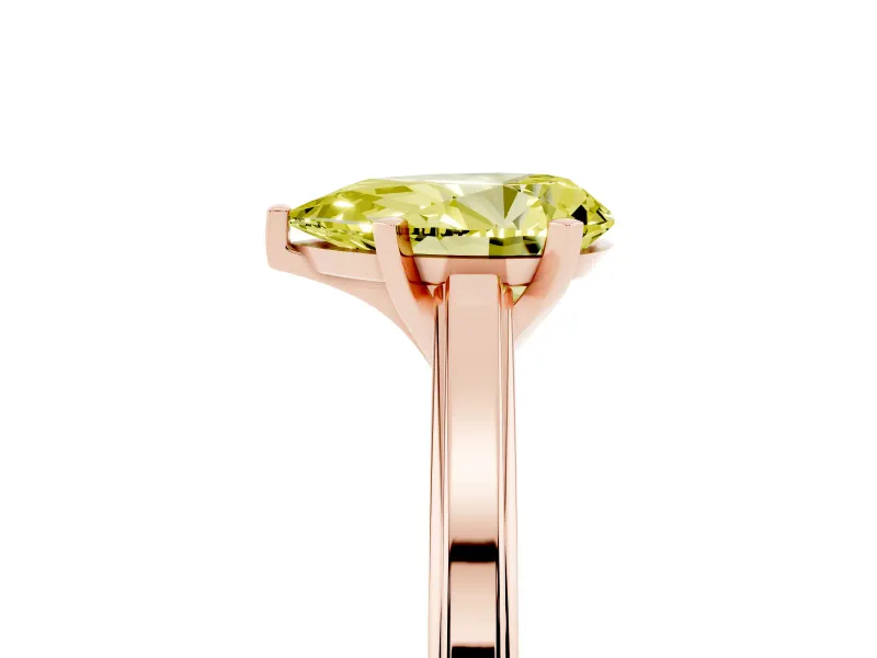 Fancy Yellow Pear Cut Diamond Solitaire Ring Set in Rose gold with Prong Setting and Classic Band