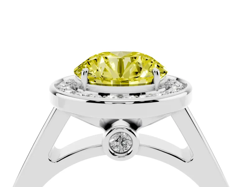 Fancy Yellow Round Cut Diamond Halo Solitaire Ring Set in White gold with Pavé Band and Bezel Setting