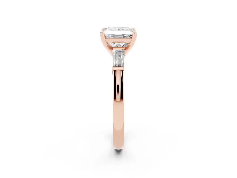 Princess Cut Diamond Solitaire Ring Set in Rose gold with Tapered Baguette Side Stones and Prong Setting